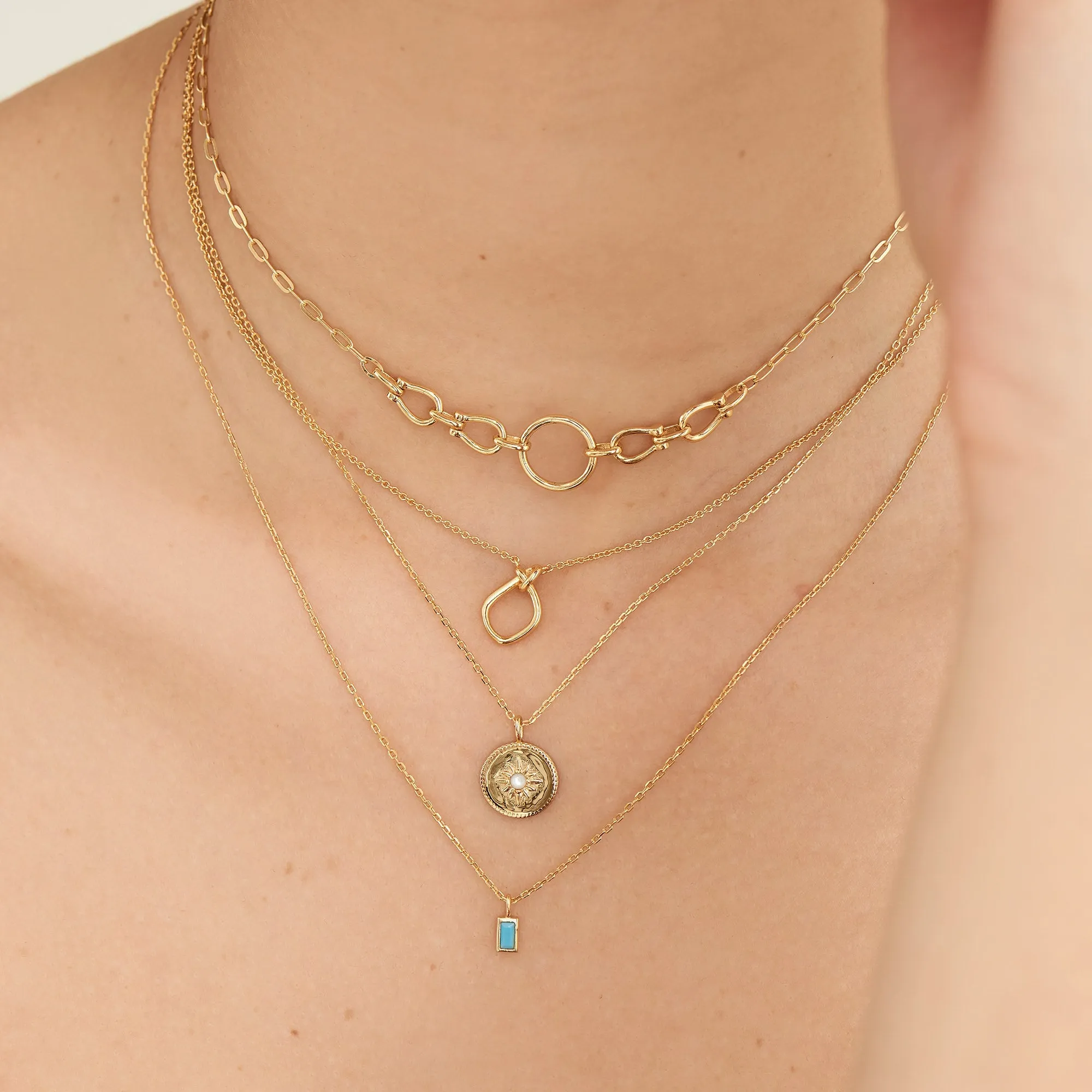 Gold Knot Pendant Necklace